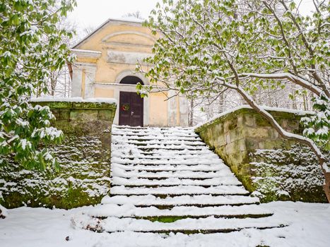 The Calvary Church and Station Cross Chapel near Cvikov, Czech Republic. Winter season with snow cover
