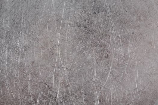 scratched real life old aluminuim flat sheet texture and full frame background.