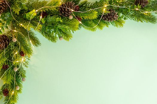 Christmas tree corner decoration on green background