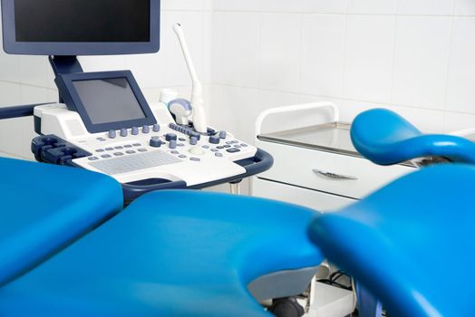 Empty Gynecological room with chair and equipment