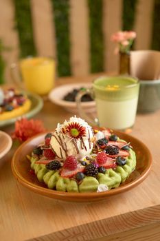 delicious waffle on wooden table. delicious breakfast waffle.