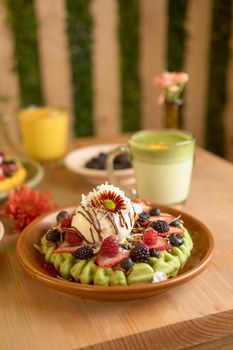 delicious waffle on wooden table. delicious breakfast waffle.