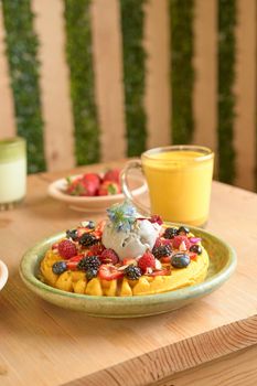 delicious waffle on wooden table. delicious breakfast waffle.