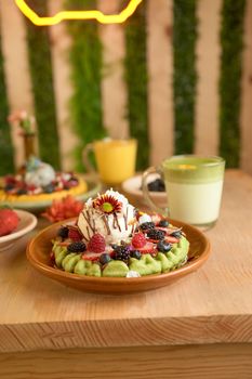 delicious waffle on wooden table. delicious breakfast waffle.