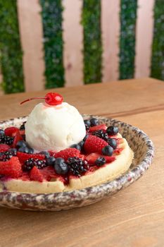 delicious waffle on wooden table. delicious breakfast waffle.