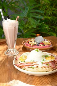 delicious waffle on wooden table. delicious breakfast waffle.