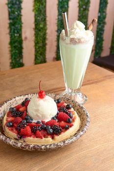 delicious waffle on wooden table. delicious breakfast waffle.