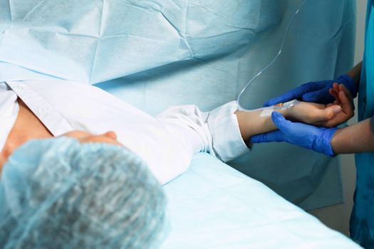 Female patient in operating room at the hospital, ready to cesarean section