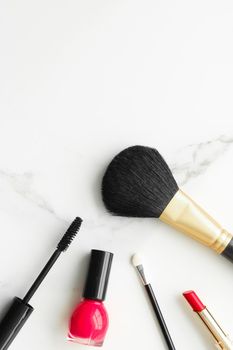 Make-up and cosmetics on marble, flatlay - modern feminine lifestyle, vlog background and styled stock concept. Beauty inspiration in a fashion blog