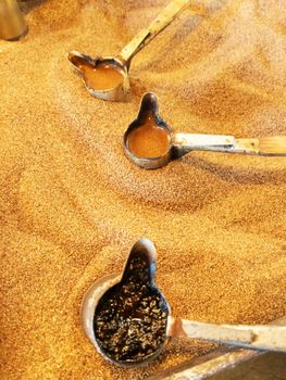 Preparation of natural coffee in Turks on the sand. Turkish coffee