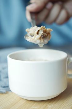 muesli chocolate flavor cereal on spoon ,