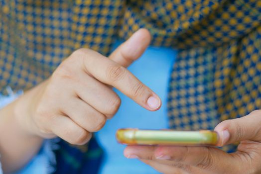 close up of women hand holding smart phone.