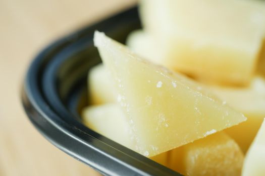 close up of fresh cheese on in a bowl ,