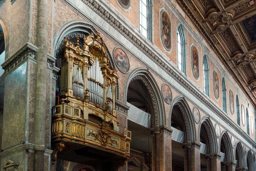 Church pipe organ and decorations inside Duomo di Napoli the Roman Catholic Cathedral of the Assumption of Mary in Campania region Naples, Italy.