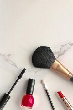 Make-up and cosmetics on marble, flatlay - modern feminine lifestyle, vlog background and styled stock concept. Beauty inspiration in a fashion blog