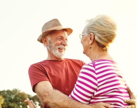 Happy active senior couple outdoors