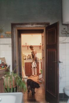 woman chef preparing african caribbean food with plantain plane tree fruit