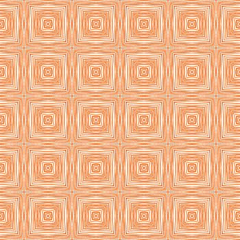 Ikat repeating swimwear design. Orange symmetrical kaleidoscope background. Summer ikat sweamwear pattern. Textile ready powerful print, swimwear fabric, wallpaper, wrapping.