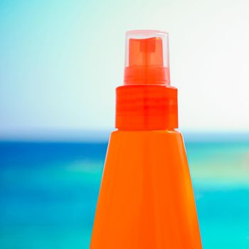 Suntan lotion, spf protection and skin care, sun tan bottle on the beach, beauty and skincare cosmetics product brand