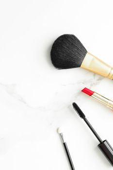 Make-up and cosmetics on marble, flatlay - modern feminine lifestyle, vlog background and styled stock concept. Beauty inspiration in a fashion blog