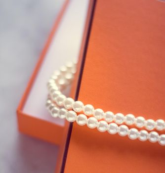 Chic pearl jewellery in a present box - Valentine's day ideas, luxury shopping and holiday inspiration concept. The perfect gift for her