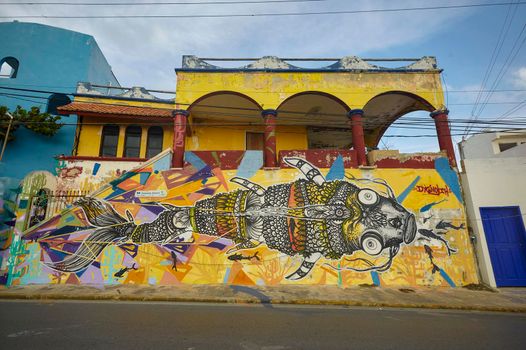 Isla Mujeres, Mexico 20 august 2022: Beautiful colorful graffiti decorates a lost building in Isla Mujeres in Mexico