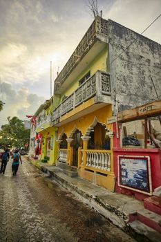 Isla Mujeres, Mexico 20 august 2022: Vertical shot of the architecture of a street of Isla Mujeres in Mexico