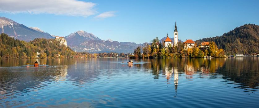 Panoramic view of Lake Bled with St. Marys Church of the Assumption on the small island. Bled, Slovenia, Europe