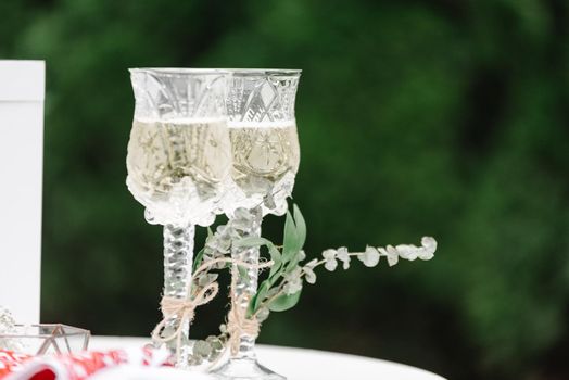 wedding glasses on the background of the arch.