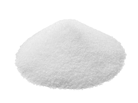 Close up of a pile of salt on white background