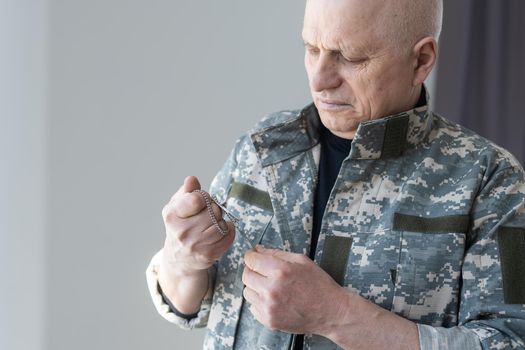 Elderly military officer isolated on white background.