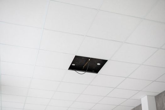 White ceiling in the office. White ceiling can reflect light well. The right light at work. Abstract empty white interior space office. copy space