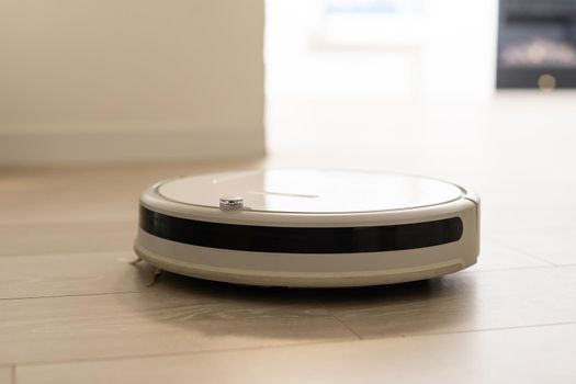 robotic vacuum cleaner on the floor.