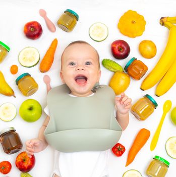 Puree for baby food with vegetables and fruits. Selective focus. nutrition. The first complementary feeding of the child. A happy child. A well- fed child