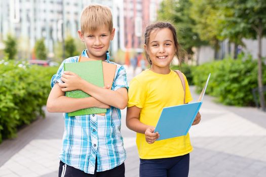 Portrait of smiling little school kids.