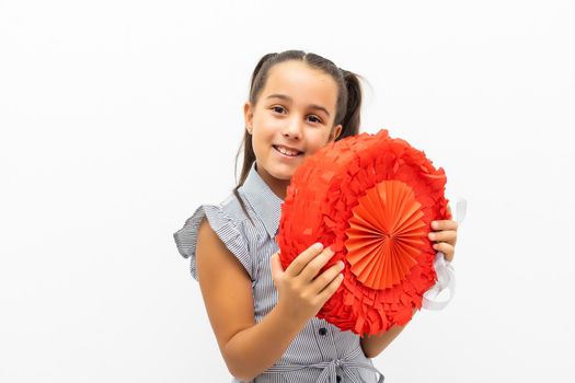 Photo of small dreamy lady hold pinata isolated white background.