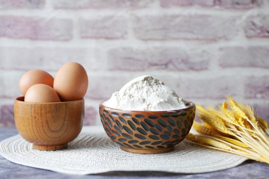 wheat flour in a bowl on table ,