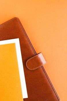 Modern workspace, productivity and corporate lifestyle concept - Luxury business brown brief-case on the office table desk, flatlay