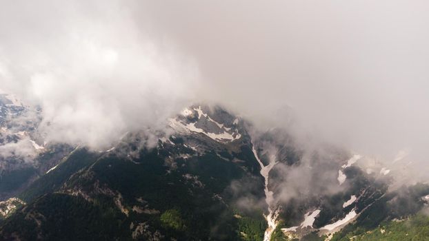 Spring morning at mountains and clouds.