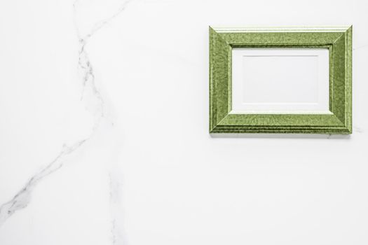 Modern feminine, artwork mock up, luxury design concept. Decorate with chic and style - Green photo frame on marble, flatlay