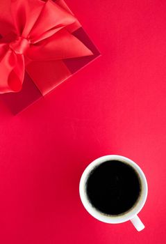 Romantic celebration, lifestyle and birthday present concept - Luxury beauty gift box and coffee on red, flatlay