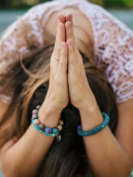 Woman hands together symbolizing prayer and gratitude. Mudra. Yoga concept. High quality photo