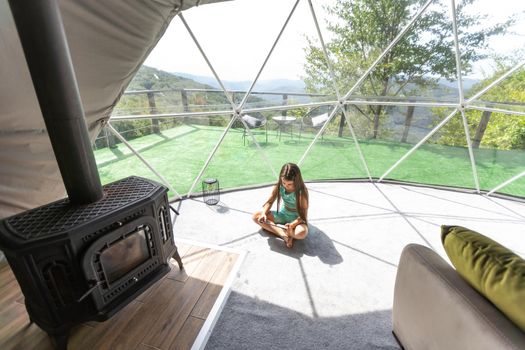 childhood, technology and hygge concept - happy little girl with tablet pc computer in geo dome tents