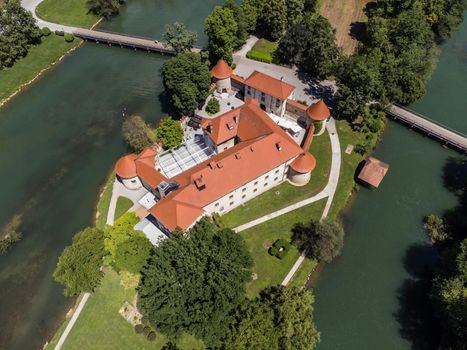 Romantic Otocec Castle on Krka River in Slovenia. Drone View