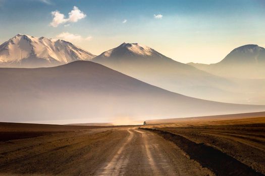 Country road in Atacama desert, volcanic arid landscape in Northern Chile border with Bolivia, South America
