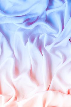 Neon soft silk waves, flatlay - elegant fabric textures, abstract backgrounds and modern pastel colours concept. Feel the sense of timeless luxury