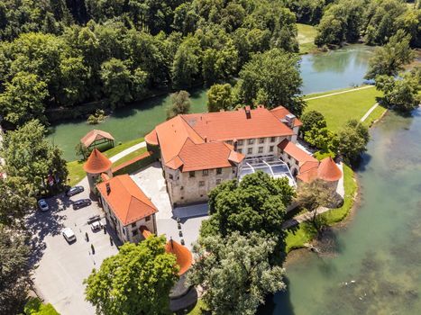 Romantic Otocec Castle on Krka River in Slovenia. Drone View