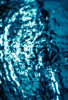 Abstract blue liquid surface as background - futuristic design and science concept. Deep blue waters