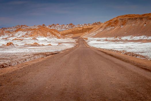 Country road in Atacama desert, moon valley arid landscape in Northern Chile, South America