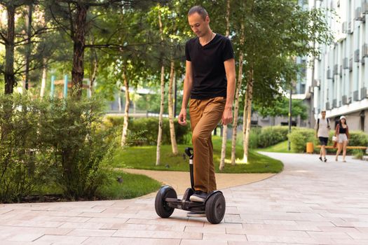 Person Riding a HoverBoard on a Public Footpath, They are now banned in all public places.